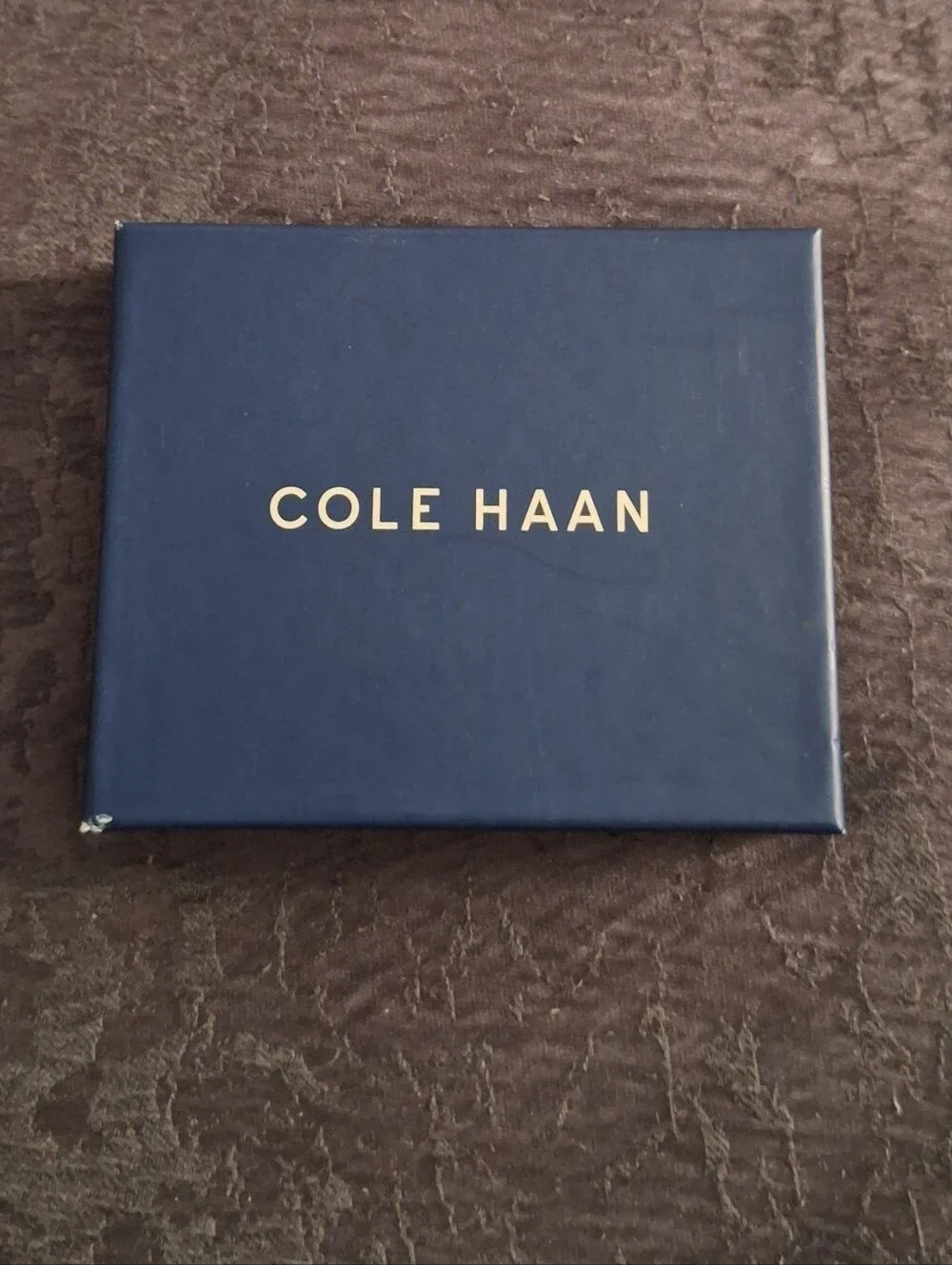 Cole Haan compact leather